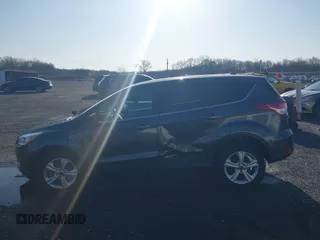 2016 Ford Escape SE with VIN 1FMCU9GX1GUB67636, listed as a IAAI auction lot 41929725 with 68,297 mi miles. Bid and sale history available at carsss.com. Image 14.