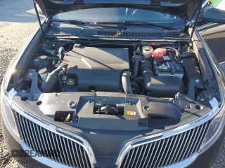 2014 Lincoln MKS EcoBoost with VIN 1LNHL9FT2EG600500, listed as a Copart auction lot 83764694 with 74,949 mi miles and Salvage title. Bid and sale history available at DreamBid. Image 11.