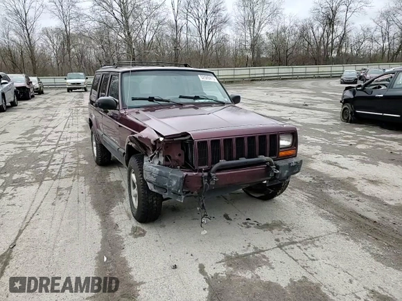 2000 Jeep Cherokee z VIN 1J4FF48S0YL254270, wystawiony jako Copart lot #52589415 z przebiegiem 166 860 mil mil oraz Szkoda całkowita • Salvage title. Historia ofert i sprzedaży dostępna na DreamBid. Obrazek 12.