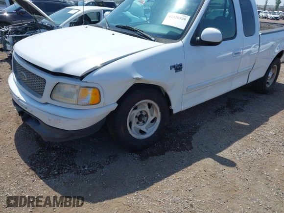 2000 Ford F-150 XL with VIN 1FTRX17L2YNA03263, listed as a IAAI auction lot 42326528 with Not provided miles and . Bid and sale history available at DreamBid. Image 6.