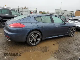 2014 Porsche Panamera с VIN WP0AA2A79EL009679, выставлен на аукционе Copart как лот 85499224 с пробегом 80 908 миль миль и Списание • Salvage title. История ставок и продаж доступна на DreamBid. Изображение 3.