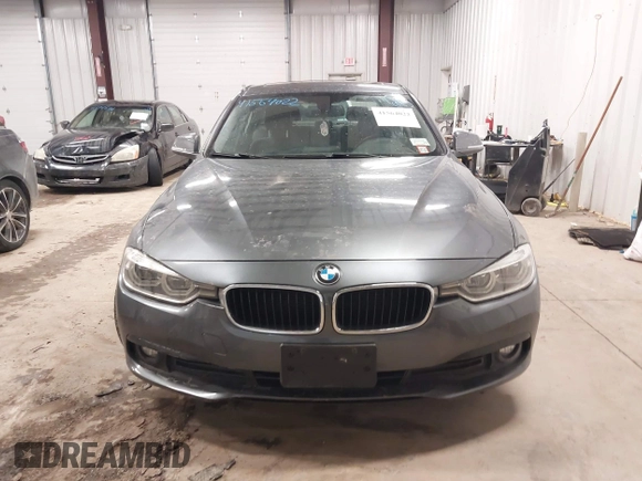2018 BMW 3 Series 320i xDrive with VIN WBA8E5G50JNU48047, listed as a IAAI auction lot 41564022 with 69,971 mi miles. Bid and sale history available at carsss.com. Image 12.