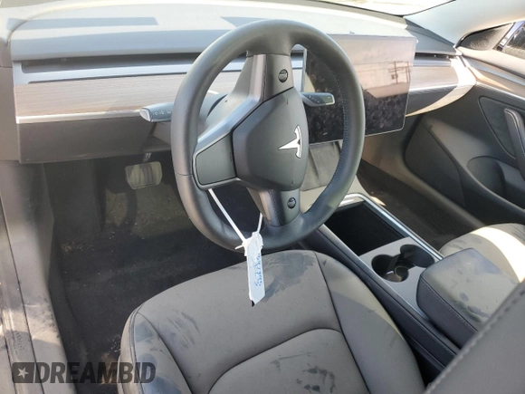 2023 Tesla Model 3 z VIN 5YJ3E1EA6PF649934, wystawiony jako Copart lot #47597395 z przebiegiem Nie podano mil oraz Szkoda całkowita • Salvage title. Historia ofert i sprzedaży dostępna na DreamBid. Obrazek 8.