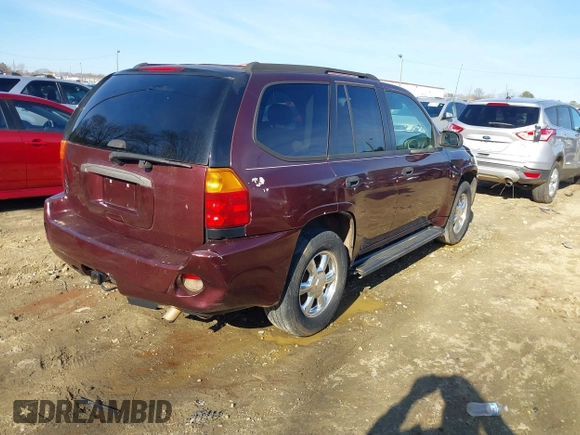 2007 GMC Envoy SLE with VIN 1GKDS13S472201367, listed as a IAAI auction lot 41327646 with 232,019 mi miles. Bid and sale history available at carsss.com. Image 4.