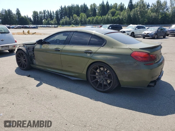 2017 BMW M6 z VIN WBS6E9C53HG437414, wystawiony jako Copart lot #61141685 z przebiegiem 89 893 mil mil oraz Szkoda całkowita • Salvage title. Historia ofert i sprzedaży dostępna na DreamBid. Obrazek 2.