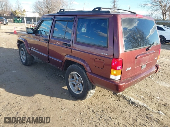2000 Jeep Cherokee Classic with VIN 1J4FF58S7YL122676, listed as a IAAI auction lot 41710310 with 124,758 mi miles. Bid and sale history available at carsss.com. Image 3.