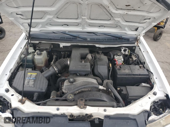 2008 Chevrolet Colorado z VIN 1GCDT43E088221344, wystawiony jako Copart lot #57488905 z przebiegiem 164 665 mil mil oraz Szkoda całkowita • Salvage title. Historia ofert i sprzedaży dostępna na DreamBid. Obrazek 11.