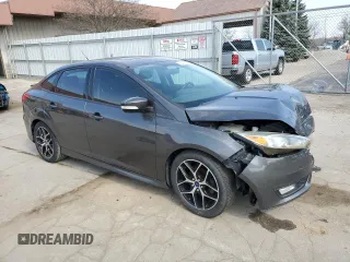 2015 Ford Focus SE z VIN 1FADP3F29FL340350, wystawiony jako Copart lot #53466455 z przebiegiem 146 374 mil mil oraz Szkoda całkowita • Salvage title. Historia ofert i sprzedaży dostępna na DreamBid. Obrazek 4.