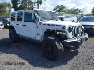 2022 Jeep Wrangler Unlimited Rubicon with VIN 1C4HJXFG8NW130156, listed as a IAAI auction lot 42004630 with 129,313 mi miles and . Bid and sale history available at DreamBid. Image 1.
