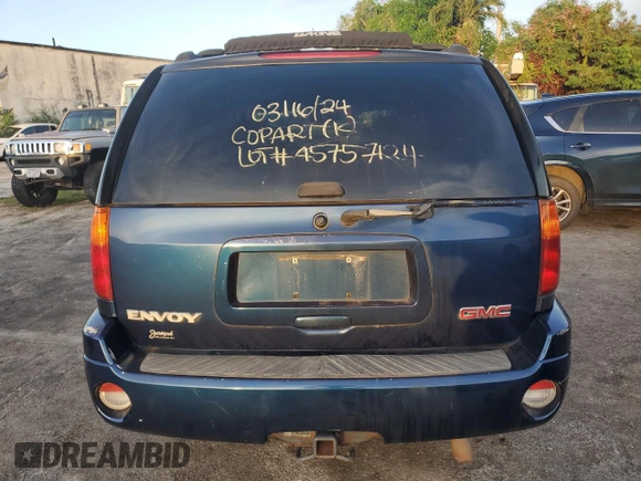 2003 GMC Envoy SLE z VIN 1GKDT13S432374541, wystawiony jako Copart lot #45757124 z przebiegiem Nie podano mil oraz Nie do naprawy • Non repairable. Historia ofert i sprzedaży dostępna na DreamBid. Obrazek 6.