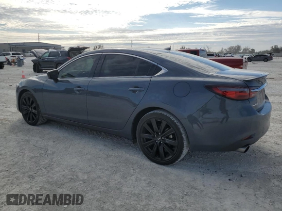 2021 Mazda 6 Carbon Edition with VIN JM1GL1WY6M1618139, listed as a Copart auction lot 88761045 with 82,377 mi miles and Non Repairable. Bid and sale history available at DreamBid. Image 2.