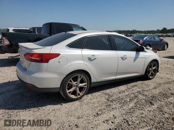 2015 Ford Focus Titanium with VIN 1FADP3J23FL248349, listed as a Copart auction lot 52599275 with 124,450 mi miles and Clean Title. Bid and sale history available at carsss.com. Image 3.