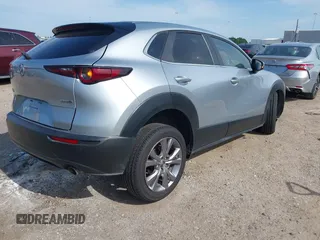 2021 Mazda CX-30 Select with VIN 3MVDMABL8MM273045, listed as a IAAI auction lot 42258604 with 47,805 mi miles and . Bid and sale history available at DreamBid. Image 4.