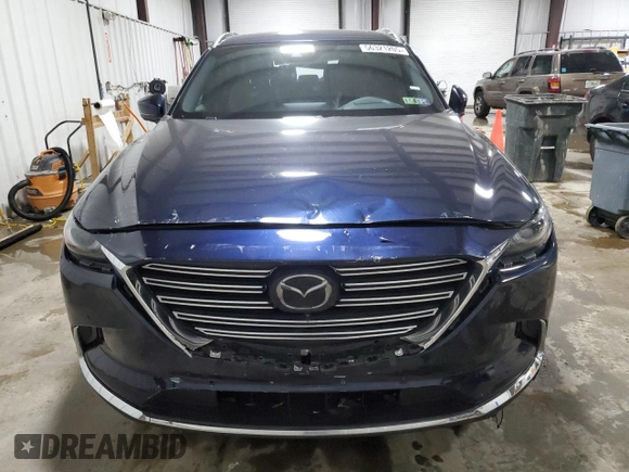 2023 Mazda CX-9 Grand Touring with VIN JM3TCBDY1P0630868, listed as a Copart auction lot 56321205 with 50,427 mi miles and Salvage title. Bid and sale history available at DreamBid. Image 5.