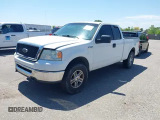 2007 Ford F-150 STX with VIN 1FTRX14W07FA87865, listed as a IAAI auction lot 42333510 with 173,973 mi miles and . Bid and sale history available at DreamBid. Image 2.