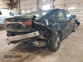 2016 Toyota Avalon Limited with VIN 4T1BK1EB3GU236479, listed as a IAAI auction lot 41370835 with 404,864 mi miles and . Bid and sale history available at carsss.com. Image 4.