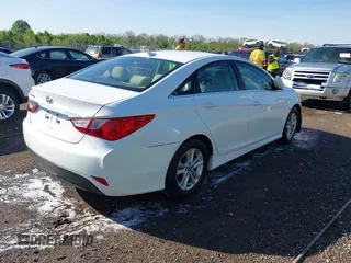2014 Hyundai Sonata GLS with VIN 5NPEB4AC2EH882685, listed as a IAAI auction lot 42125895 with 68,669 mi miles and . Bid and sale history available at carsss.com. Image 4.