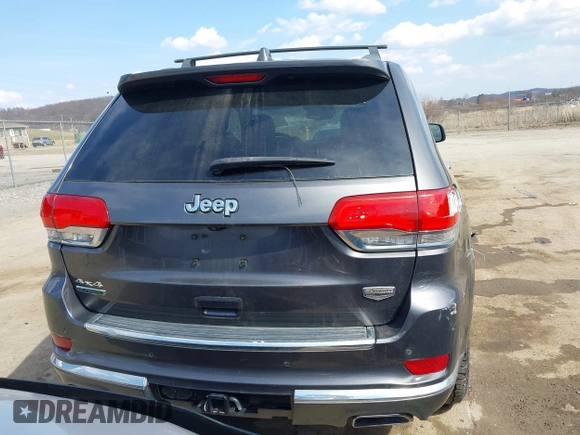 2014 Jeep Grand Cherokee Summit with VIN 1C4RJFJM5EC377129, listed as a IAAI auction lot 41763932 with 187,561 mi miles and . Bid and sale history available at DreamBid. Image 16.