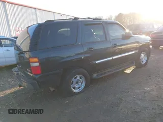 2003 GMC Yukon SLT with VIN 1GKEC13Z53R279530, listed as a IAAI auction lot 41451412 with 308,872 mi miles. Bid and sale history available at carsss.com. Image 4.