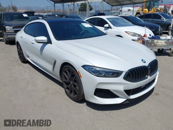 2022 BMW 8 Series M850i z VIN WBAGV8C02NCH87808, wystawiony jako IAAI lot #42255995 z przebiegiem 34 285 mil mil oraz . Historia ofert i sprzedaży dostępna na DreamBid. Obrazek 1.