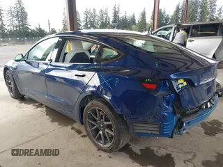 2022 Tesla Model 3 Long Range with VIN 5YJ3E1EB3NF267365, listed as a IAAI auction lot 41996594 with 32,687 mi miles and . Bid and sale history available at DreamBid. Image 3.