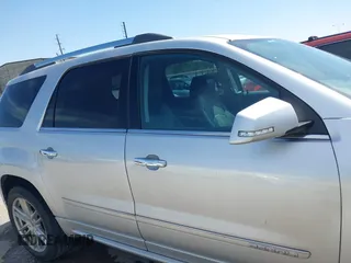 2014 GMC Acadia Denali z VIN 1GKKRTKD0EJ192610, wystawiony jako IAAI lot #41819095 z przebiegiem 121 075 mil mil oraz . Historia ofert i sprzedaży dostępna na DreamBid. Obrazek 13.