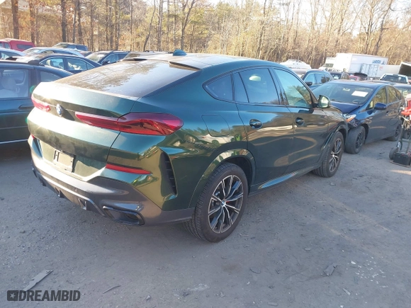 2022 BMW X6 xDrive40i with VIN 5UXCY6C01N9K27445, listed as a IAAI auction lot 41295221 with 28,328 mi miles. Bid and sale history available at carsss.com. Image 4.
