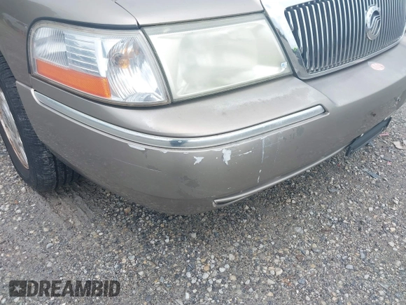 2005 Mercury Grand Marquis LS Premium z VIN 2MEFM75W25X661590, wystawiony jako IAAI lot #42534626 z przebiegiem 113 450 mil mil oraz . Historia ofert i sprzedaży dostępna na DreamBid. Obrazek 15.