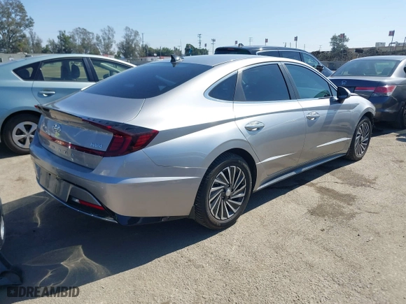 2021 Hyundai Sonata Hybrid SEL with VIN KMHL34JJ7MA026559, listed as a IAAI auction lot 41657589 with 119,019 mi miles. Bid and sale history available at carsss.com. Image 4.