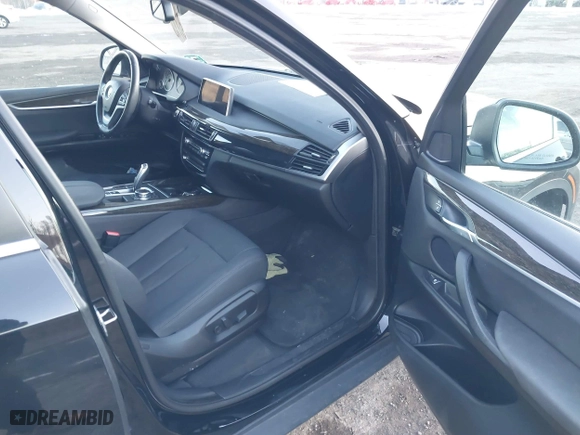 2016 BMW X5 xDrive35i with VIN 5UXKR0C50G0U11610, listed as a IAAI auction lot 41427499 with 75,330 mi miles. Bid and sale history available at carsss.com. Image 5.
