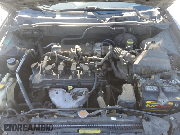 2005 Nissan Sentra S z VIN 3N1CB51DX5L543147, wystawiony jako Copart lot #87373924 z przebiegiem 246 922 mil mil oraz Szkoda całkowita • Salvage title. Historia ofert i sprzedaży dostępna na DreamBid. Obrazek 11.