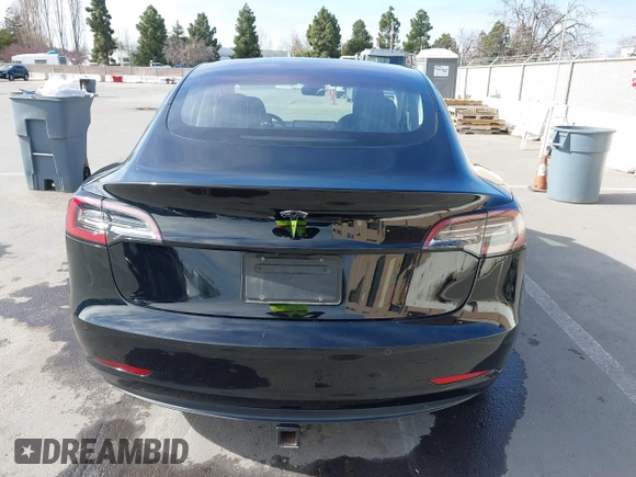 2019 Tesla Model 3 Mid Range with VIN 5YJ3E1EA2KF305834, listed as a IAAI auction lot 41719610 with 126,333 mi miles and . Bid and sale history available at DreamBid. Image 16.
