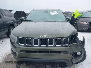 2018 Jeep Compass Altitude with VIN 3C4NJDBB1JT479462, listed as a IAAI auction lot 41276119 with 58,895 mi miles and . Bid and sale history available at carsss.com. Image 12.