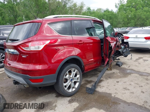 2016 Ford Escape Titanium with VIN 1FMCU9JX0GUA29353, listed as a IAAI auction lot 42133326 with 143,892 mi miles and . Bid and sale history available at DreamBid. Image 4.