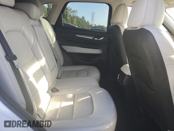 2017 Mazda CX-5 Grand Touring with VIN JM3KFADL1H0141132, listed as a Copart auction lot 51755095 with 116,220 mi miles and Salvage Title. Bid and sale history available at carsss.com. Image 11.