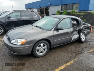 2004 Ford Taurus SES with VIN 1FAFP55S34A202771, listed as a Copart auction lot 61389605 with 180,144 mi miles and Clean title. Bid and sale history available at DreamBid. Image 1.