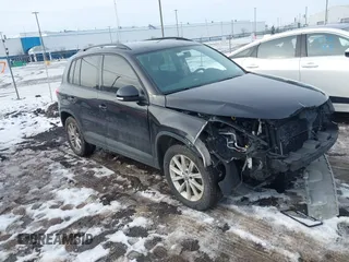 2017 Volkswagen Tiguan S with VIN WVGBV7AX7HK047973, listed as a IAAI auction lot 41197329 with 92,960 mi miles and . Bid and sale history available at DreamBid. Image 1.