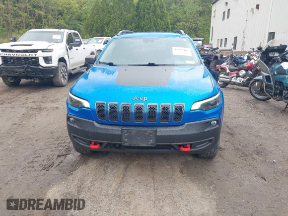2021 Jeep Cherokee Trailhawk with VIN 1C4PJMBXXMD173102, listed as a IAAI auction lot 42205402 with 57,321 mi miles and . Bid and sale history available at DreamBid. Image 13.