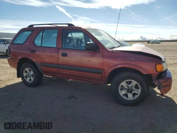 1999 Isuzu Rodeo S with VIN 4S2CM58WXX4318576, listed as a Copart auction lot 44378265 with 258,981 mi miles and Salvage Title. Bid and sale history available at DreamBid. Image 4.