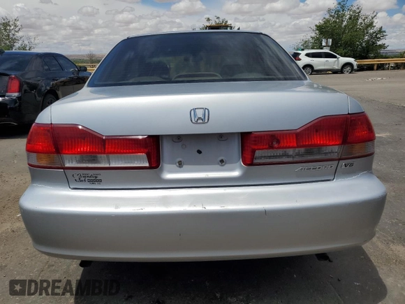 2002 Honda Accord EX z VIN 1HGCG16572A069123, wystawiony jako Copart lot #55861375 z przebiegiem 117 455 mil mil oraz Szkoda całkowita • Salvage title. Historia ofert i sprzedaży dostępna na DreamBid. Obrazek 6.