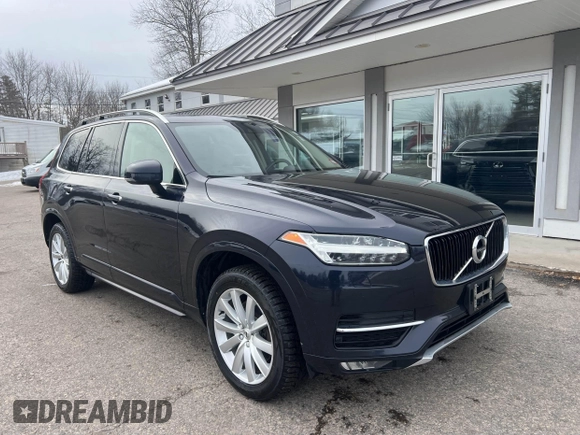 2017 Volvo XC90 Momentum with VIN YV4A22PK4H1122879, listed as a IAAI auction lot 41604685 with 164,460 mi miles. Bid and sale history available at carsss.com. Image 1.