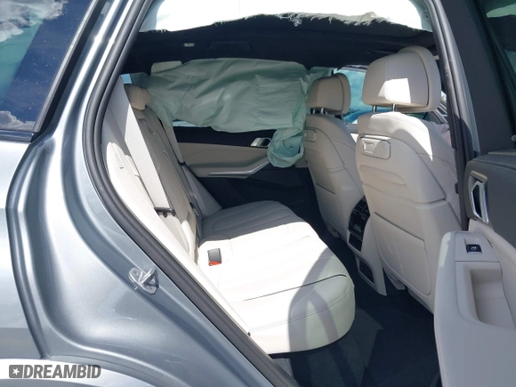 2025 BMW X5 M60i with VIN 5UX33EU03S9X62019, listed as a IAAI auction lot 41623189 with 5,749 mi miles. Bid and sale history available at carsss.com. Image 8.