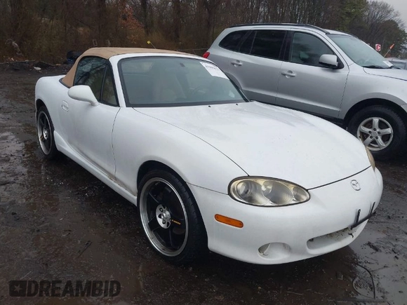 2002 Mazda MX-5 Miata Cloth z VIN JM1NB353420221527, wystawiony jako IAAI lot #41909623 z przebiegiem 90 260 mil mil oraz . Historia ofert i sprzedaży dostępna na DreamBid. Obrazek 1.