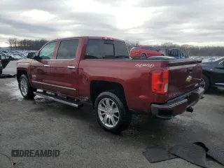 2016 Chevrolet Silverado 1500 High Country with VIN 3GCUKTEC7GG173343, listed as a Copart auction lot 86071504 with 124,675 mi miles and Salvage Title. Bid and sale history available at DreamBid. Image 2.