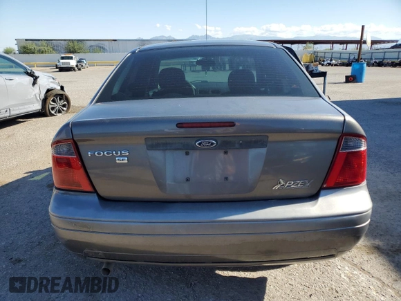 2007 Ford Focus S z VIN 1FAHP34N77W192231, wystawiony jako Copart lot #59020505 z przebiegiem 99 284 mil mil oraz Szkoda całkowita • Salvage title. Historia ofert i sprzedaży dostępna na DreamBid. Obrazek 6.