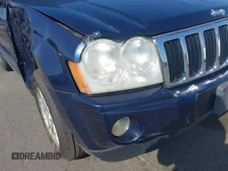 2005 Jeep Grand Cherokee Laredo with VIN 1J4HR48N45C605543, listed as a IAAI auction lot 42612473 with 158,456 mi miles and . Bid and sale history available at DreamBid. Image 13.