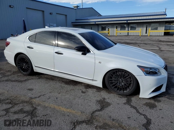 2015 Lexus LS with VIN JTHBL5EF1F5135587, listed as a Copart auction lot 45588705 with 116,289 mi miles and Salvage Title. Bid and sale history available at carsss.com. Image 4.