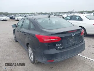 2016 Ford Focus SE with VIN 1FADP3F21GL305027, listed as a IAAI auction lot 41930646 with 106,127 mi miles and . Bid and sale history available at DreamBid. Image 3.