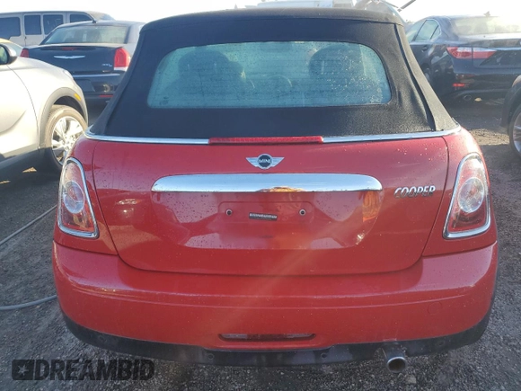 2014 MINI Convertible with VIN WMWZN3C5XET266498, listed as a Copart auction lot 77763074 with 76,680 mi miles and Non repairable. Bid and sale history available at DreamBid. Image 6.