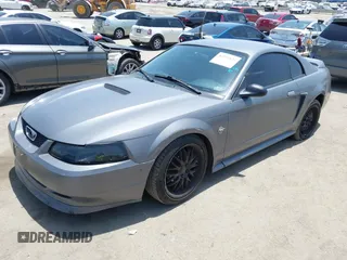 1999 Ford Mustang with VIN 1FAFP4046XF202967, listed as a IAAI auction lot 42574831 with 138,068 mi miles and . Bid and sale history available at DreamBid. Image 17.